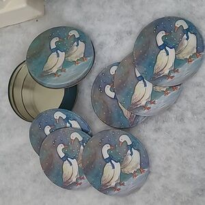 Vintage J.S.N.Y. set of six winter geese coasters with a matching storage tin